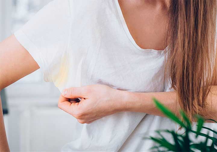 A Step-By-Step Guide To Removing Sweat Stains From Your Favorite Clothes