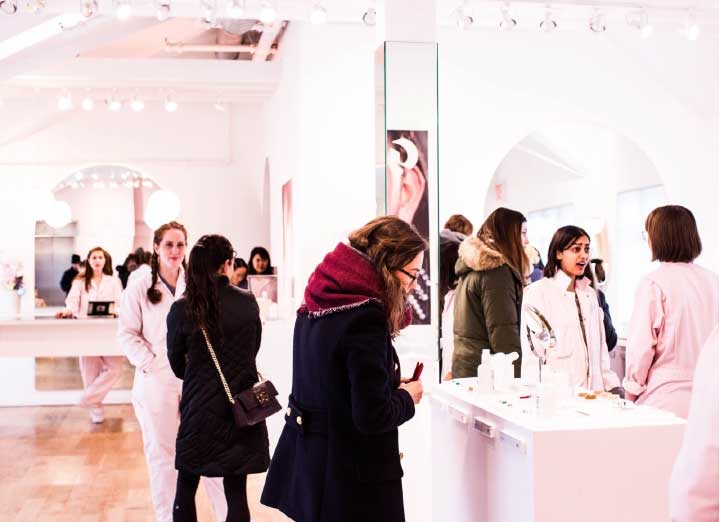 A group of people in a shop room