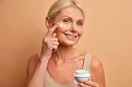 Woman with jar of cream