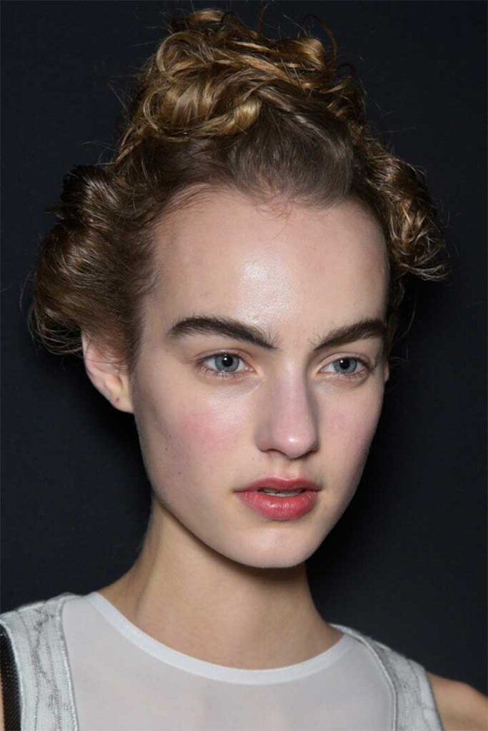 A model is seen backstage ahead of the Missoni show