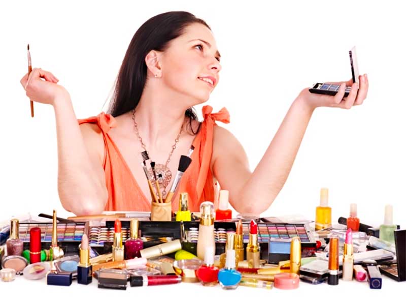Woman Surrounded By Makeup