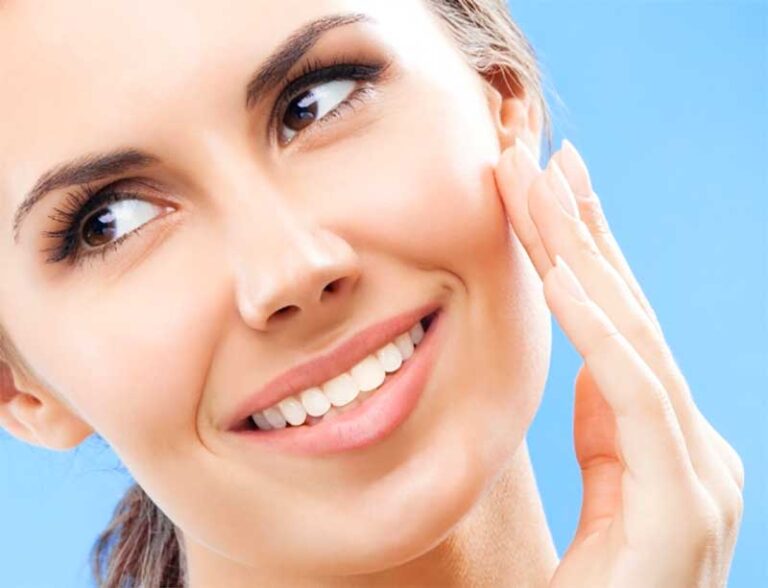 Woman Touching Face Applying Makeup