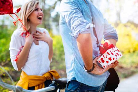Man giving surprise gift
