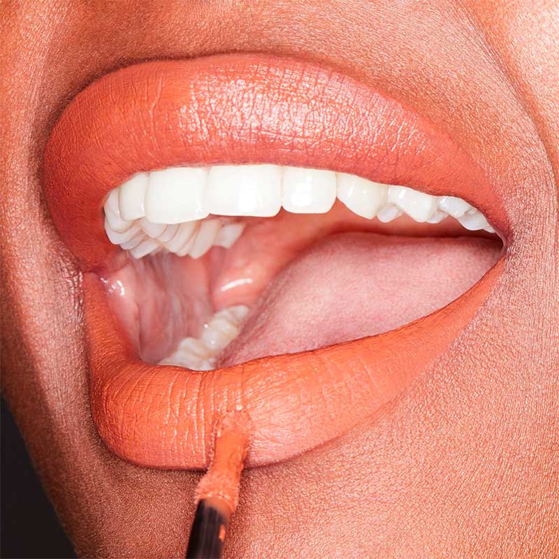 14 Bright Orange Lipsticks That Will Make You Smile All Spring