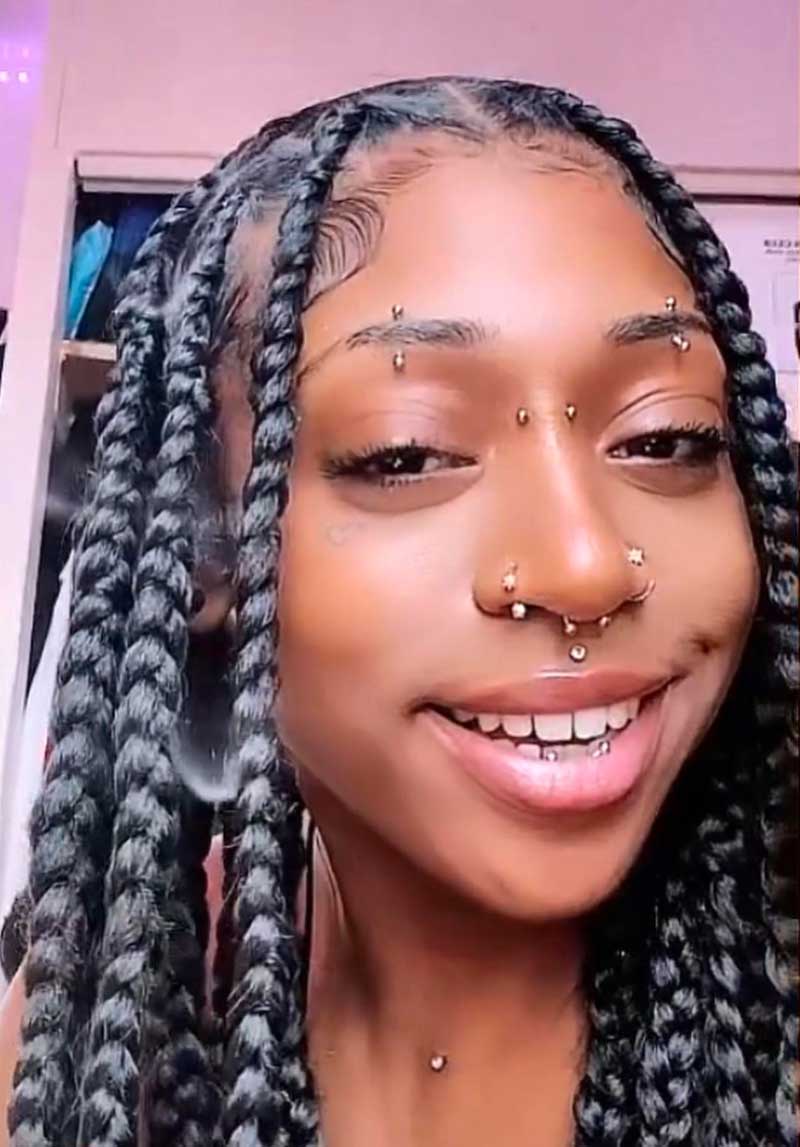 A young women with horizontal labret piercing