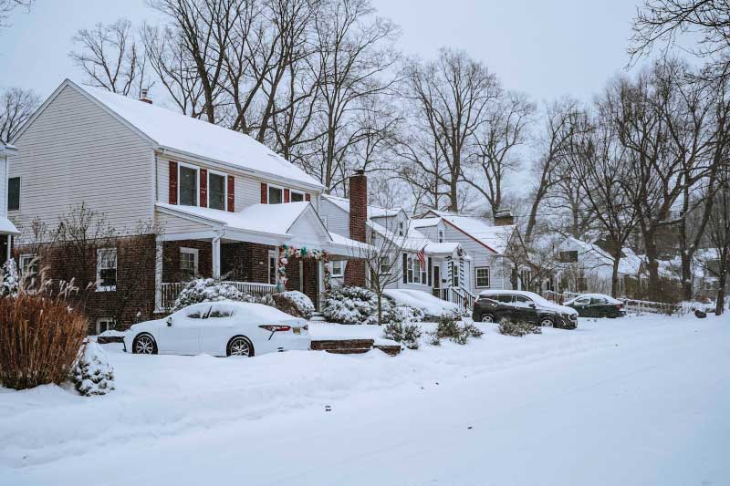 Why It's Essential to Shovel Snow Around Your Home