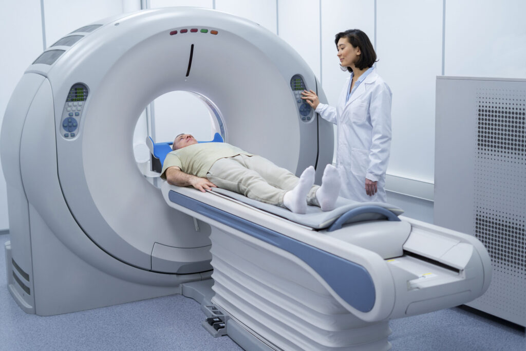 Doctor getting patient ready CT scan