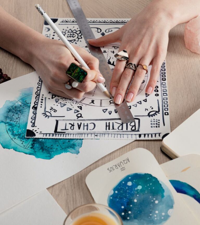 An astrology enthusiast sitting down to review their personal birth chart and understand their unique zodiac placements.