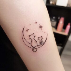minimalism tattoo of cats and stars