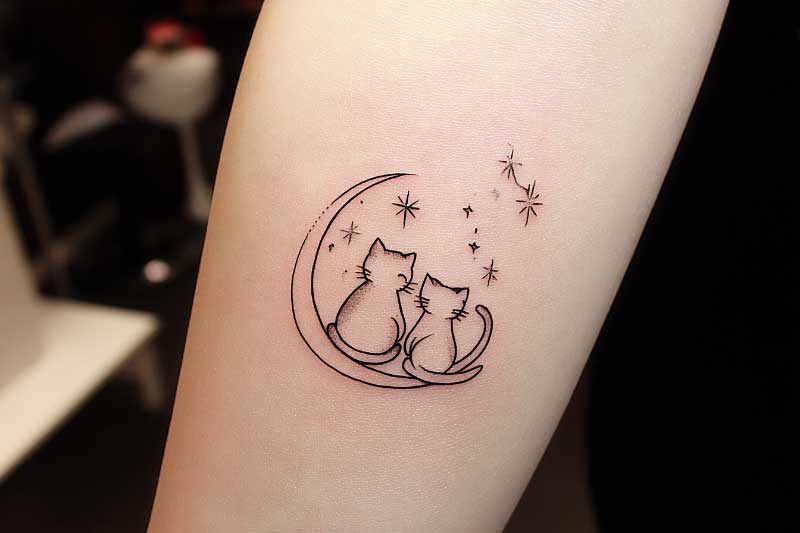 cat outline tattoo