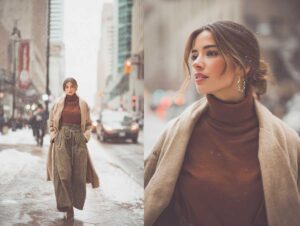 stylish woman strolling through a snow-dusted downtown street