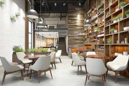 A modern, cozy café interior with a mix of contemporary and natural design elements.