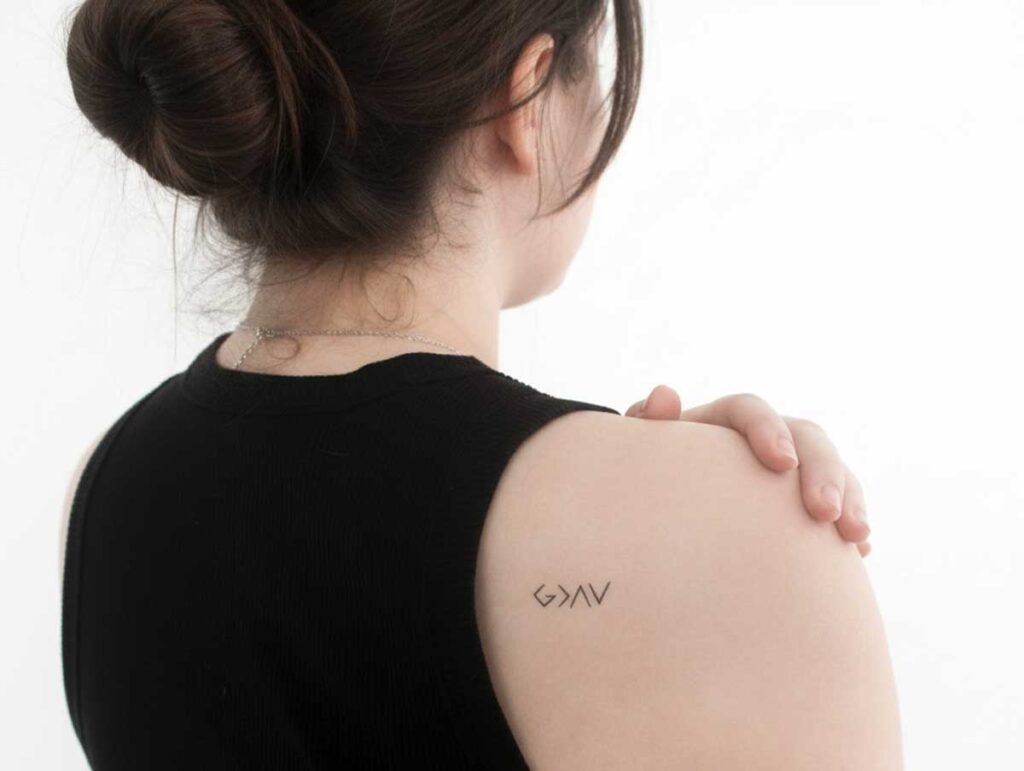 God is greater than the highs and lows tattoo meaning